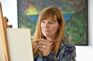 Jo at work on a painting